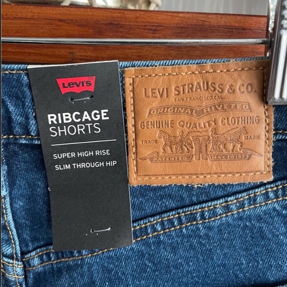 Levi’s Ribcage High Rise Distressed Ripped Denim Jean Short 77879-0012 - Picture 7 of 13